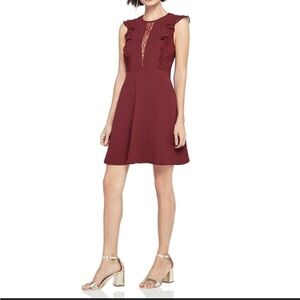 BCBGeneration Dress - burgundy flutter sleeve lace inset mini length